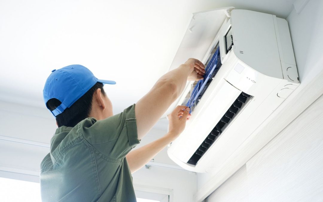 HVAC technician servicing a ductless mini split in Thousand Oaks