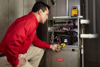 Furnace Repair Thousand Oaks Heating technician diagnosing a furnace repair in Thousand Oaks